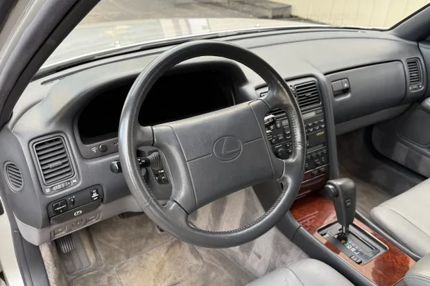 Interior of 1990 Lexus LS400 with gray leather seats.