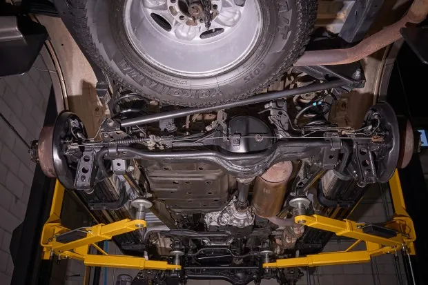 Underside view of 1997 Lexus LX450 on lift
