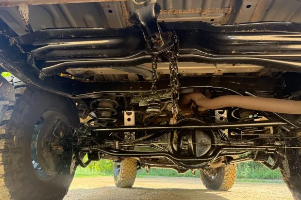 Undercarriage of 1997 Lexus LX450 showing suspension.