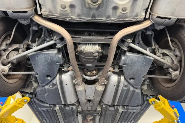 Undercarriage of 2002 Lexus LS430 on lift