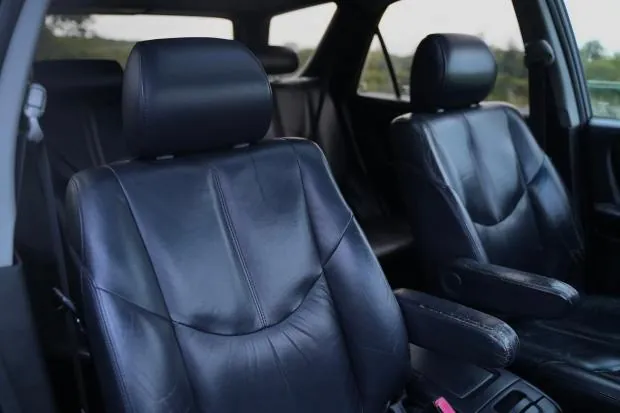 Black leather front seats in Lexus RX300.
