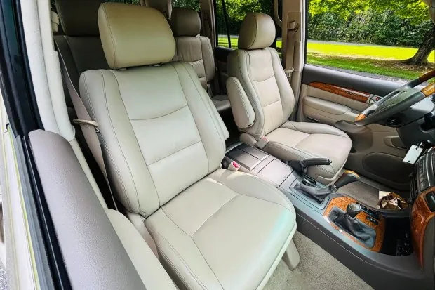 Ivory leather seats in 2004 Lexus GX470 interior.