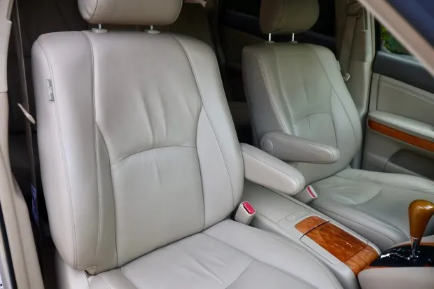Ivory leather front seats with woodgrain trim