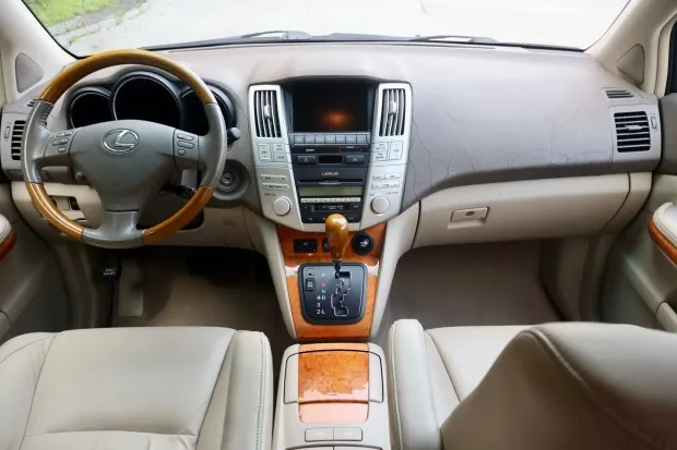 Interior of 2005 Lexus RX330 with woodgrain trim.