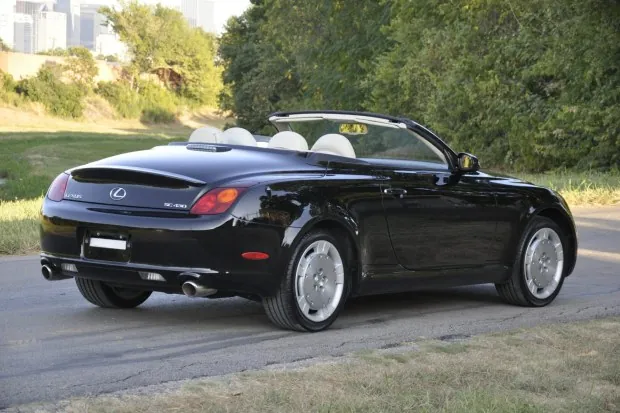 2005 Lexus SC430 convertible parked on a road.