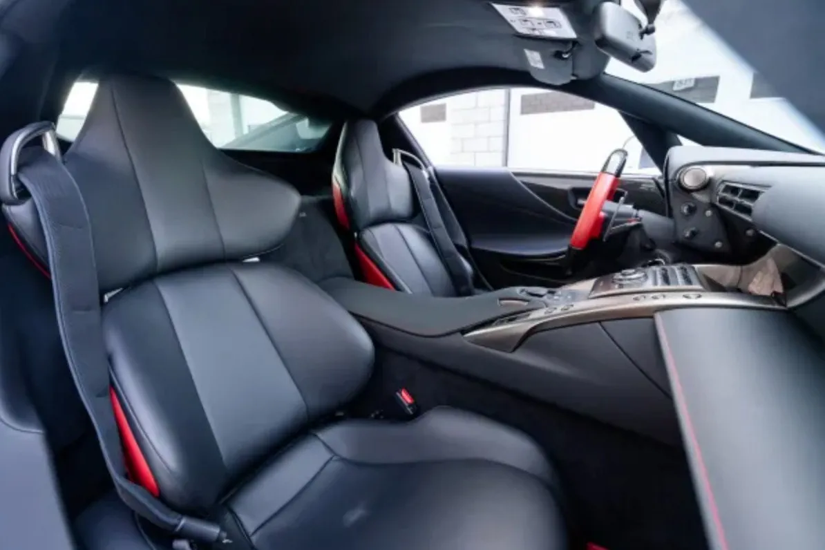 Interior of 2012 Lexus LFA with black leather seats.