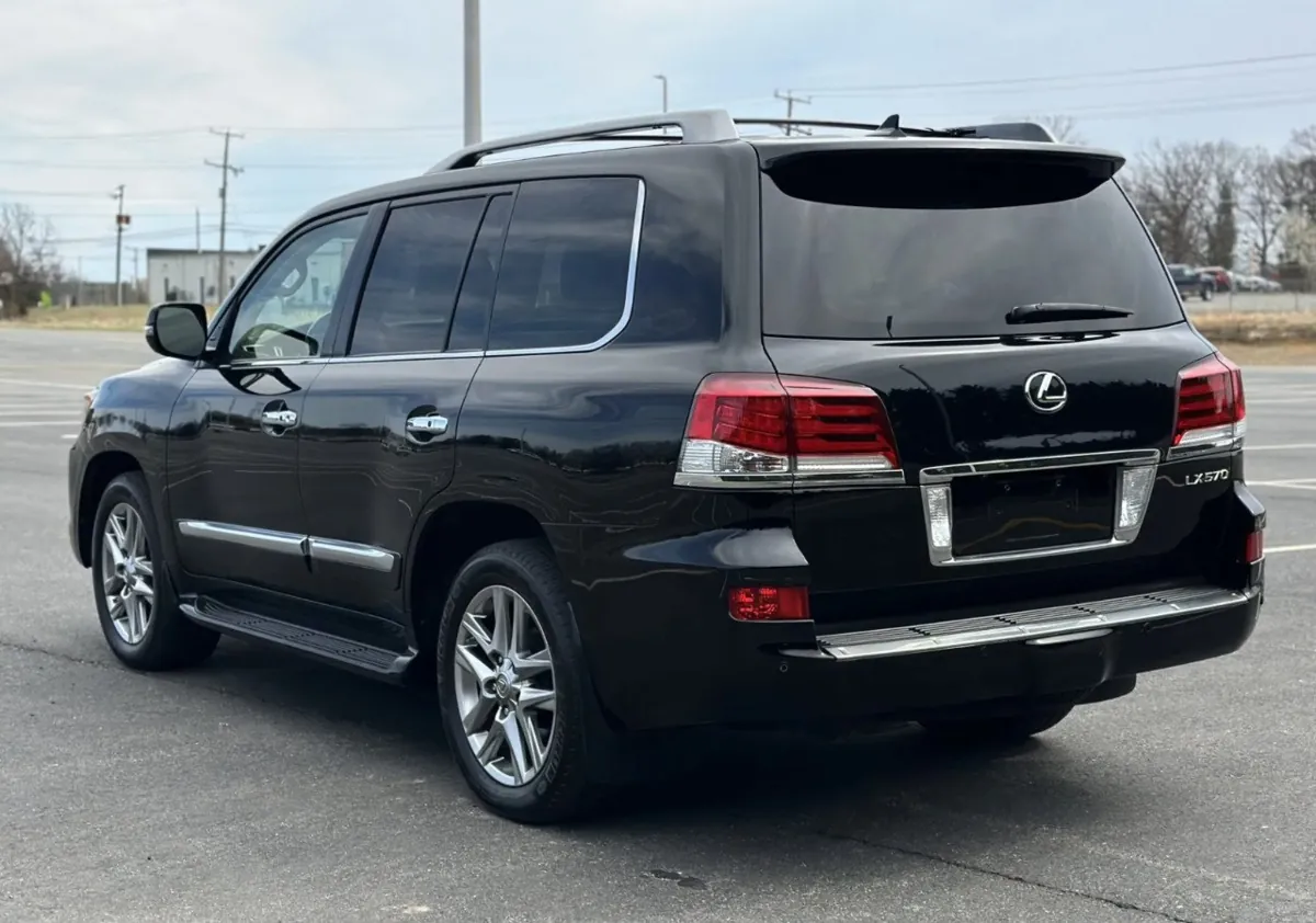 Black 2013 Lexus LX 570 parked outdoors.