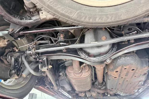 Undercarriage of 2013 Lexus LX570 showing rust.
