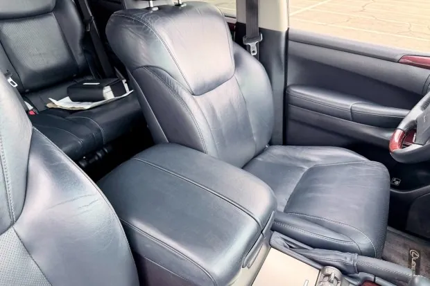 Black leather seats in Lexus LX570 interior.