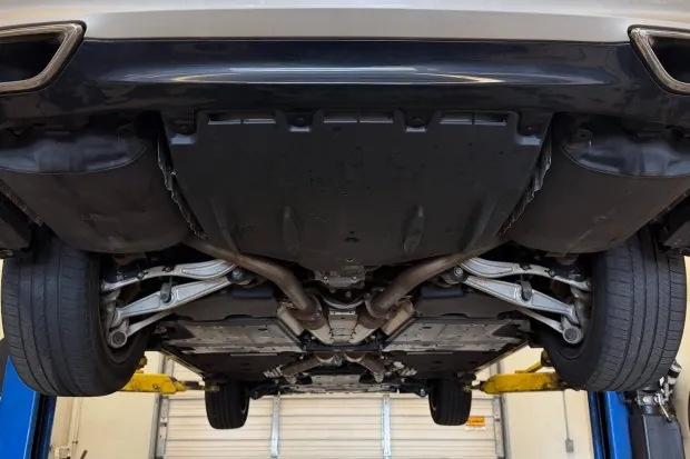 Undercarriage of 2015 Lexus LS460 on lift