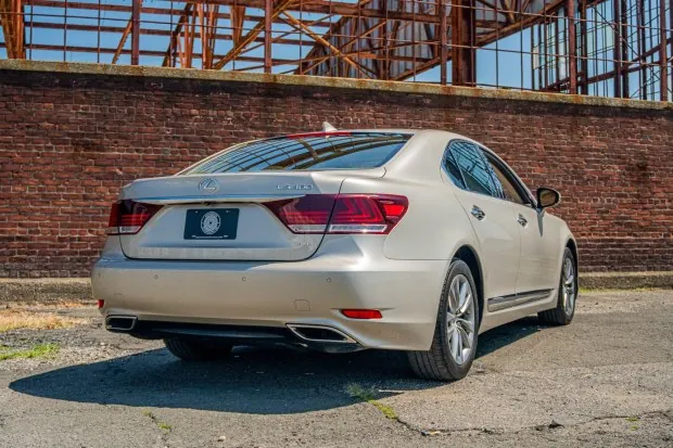 2015 Lexus LS460 parked near brick wall