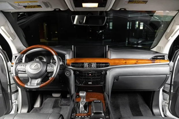 Interior of 2018 Lexus LX570 with wood trim.
