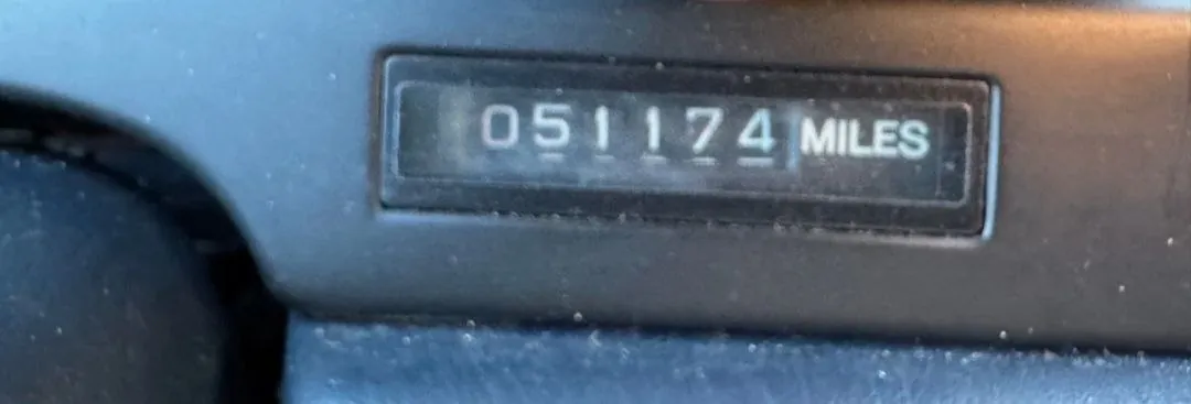 Close-up of Lexus LS400 odometer reading 51174 miles.