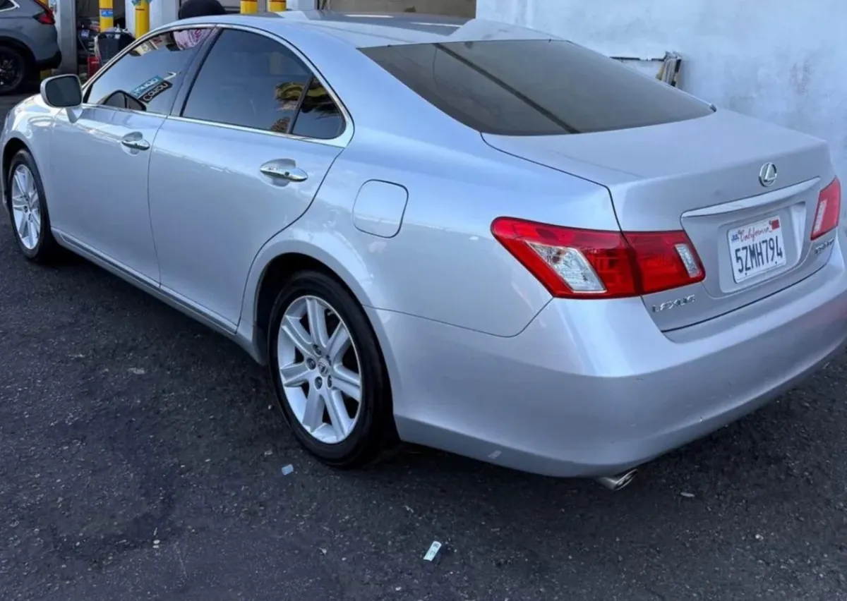 Silver Lexus ES parked outdoors.