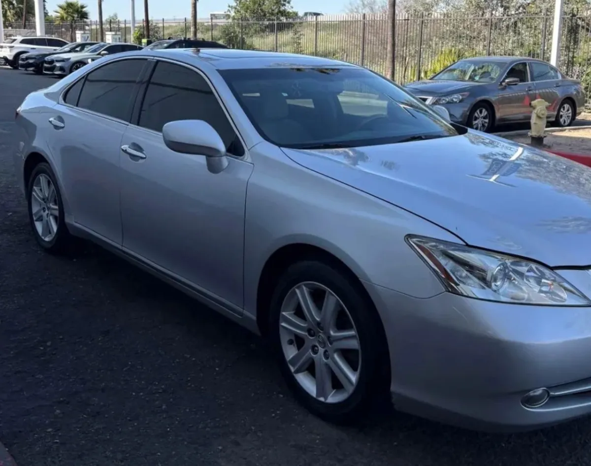 Silver Lexus ES parked on street