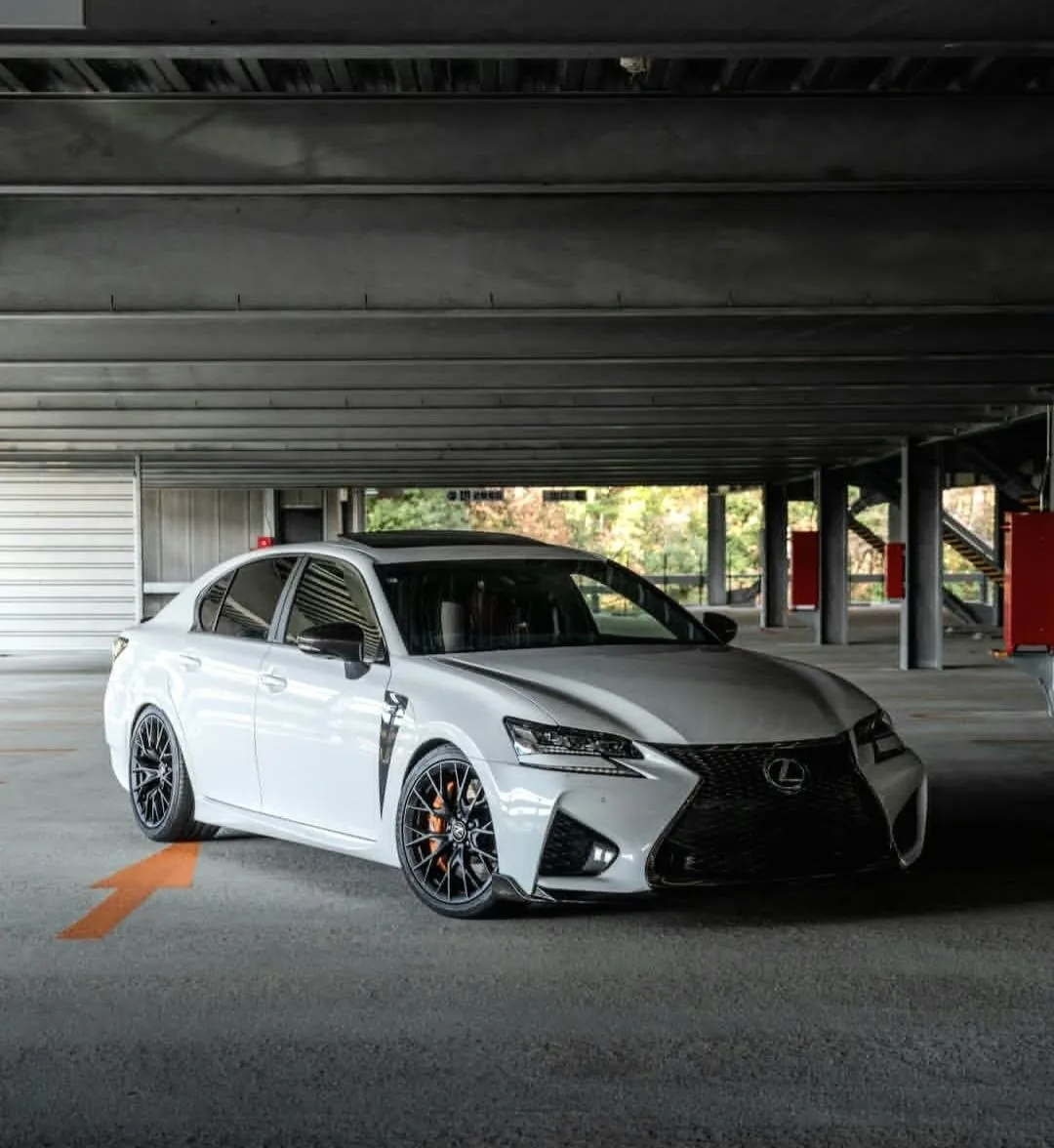 White Lexus GS parked in a garage.