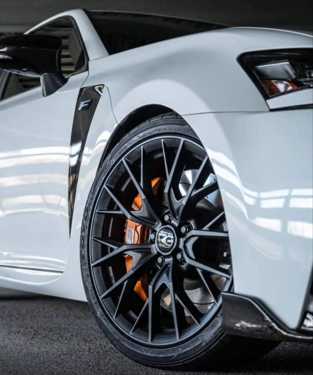Close-up of Lexus GSF wheel and brake.