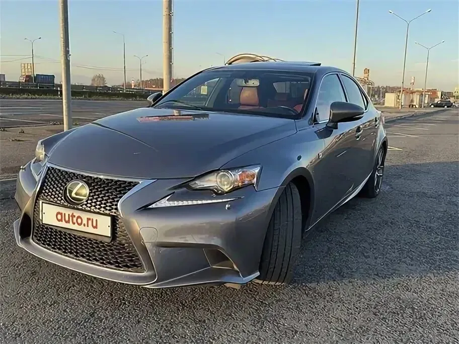 Gray Lexus IS 250 parked on road.