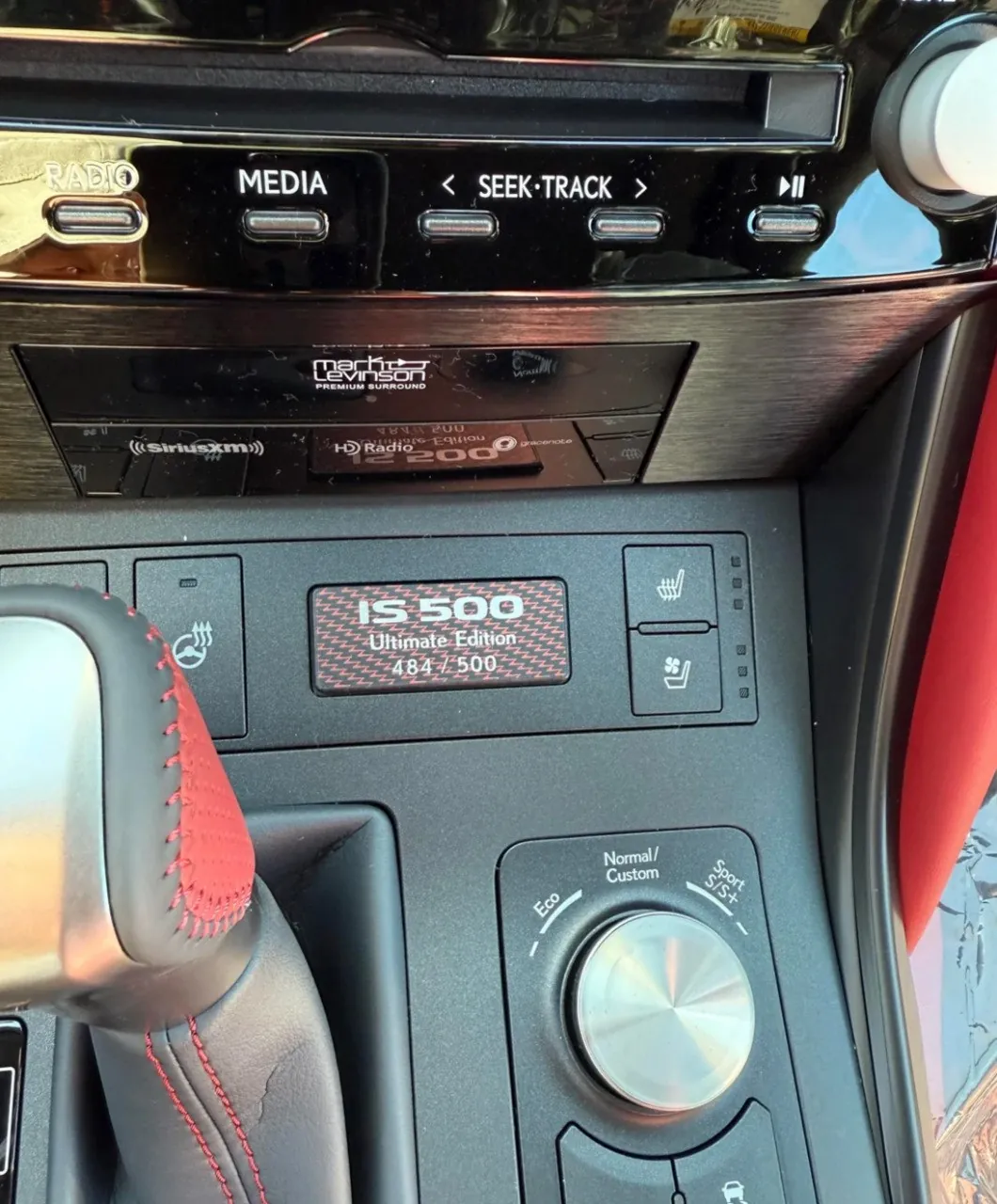 Lexus IS500 dashboard controls and badge