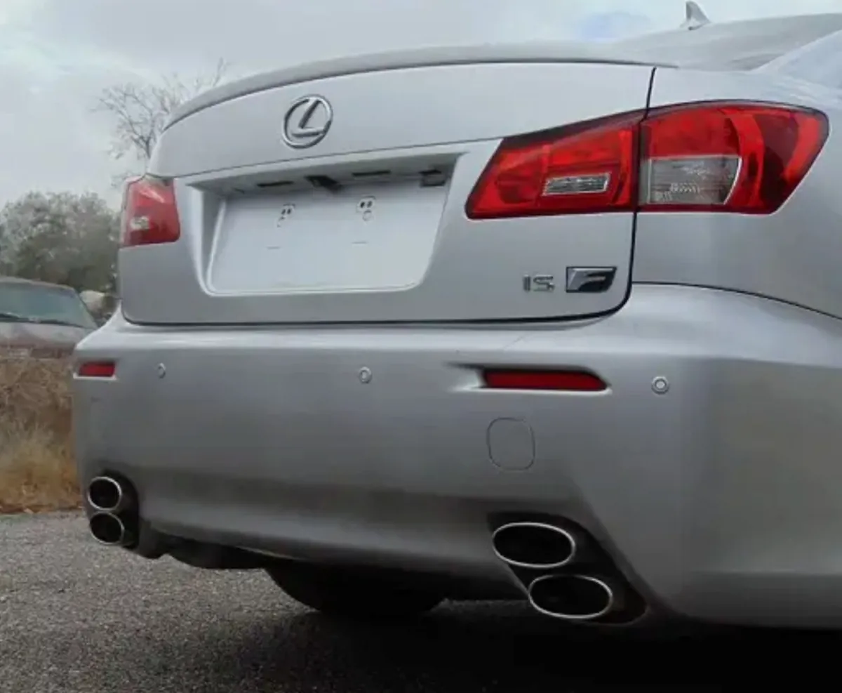 Rear view of silver Lexus ISF with quad exhausts.