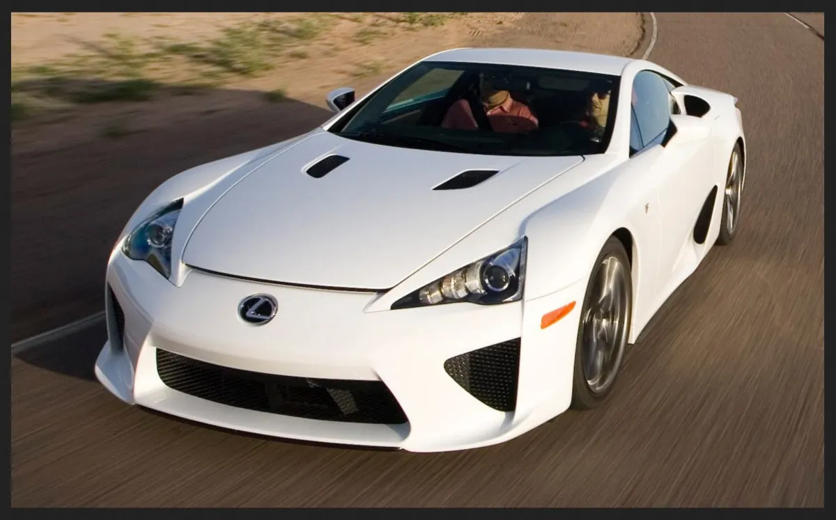 White Lexus LFA driving on road