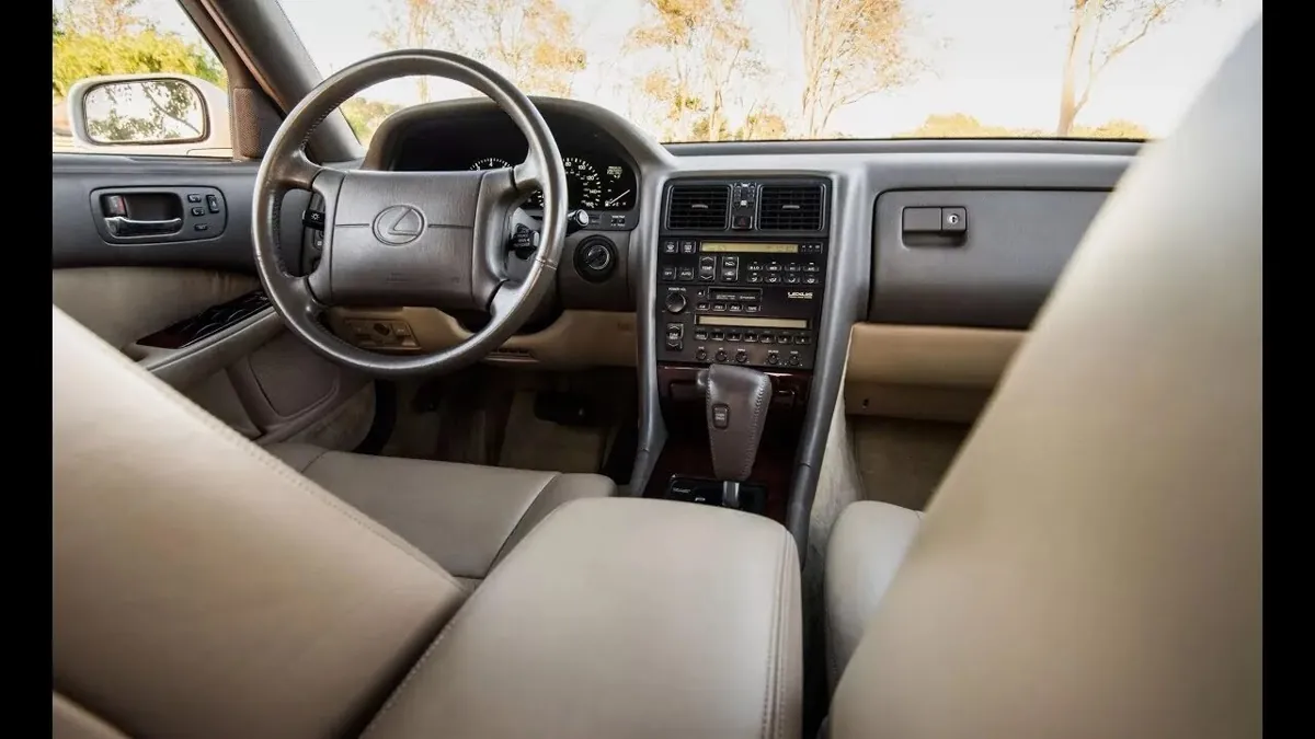 Lexus LS400 interior with beige leather seats.