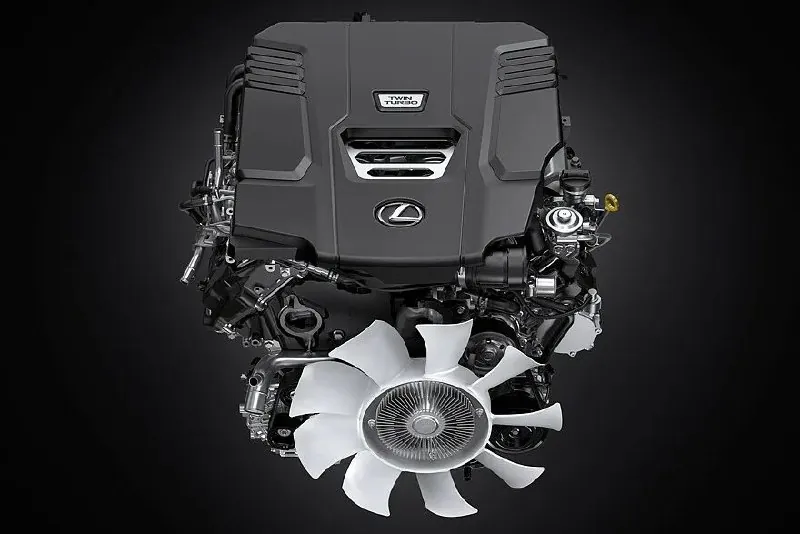 Lexus LX600 engine on black background.