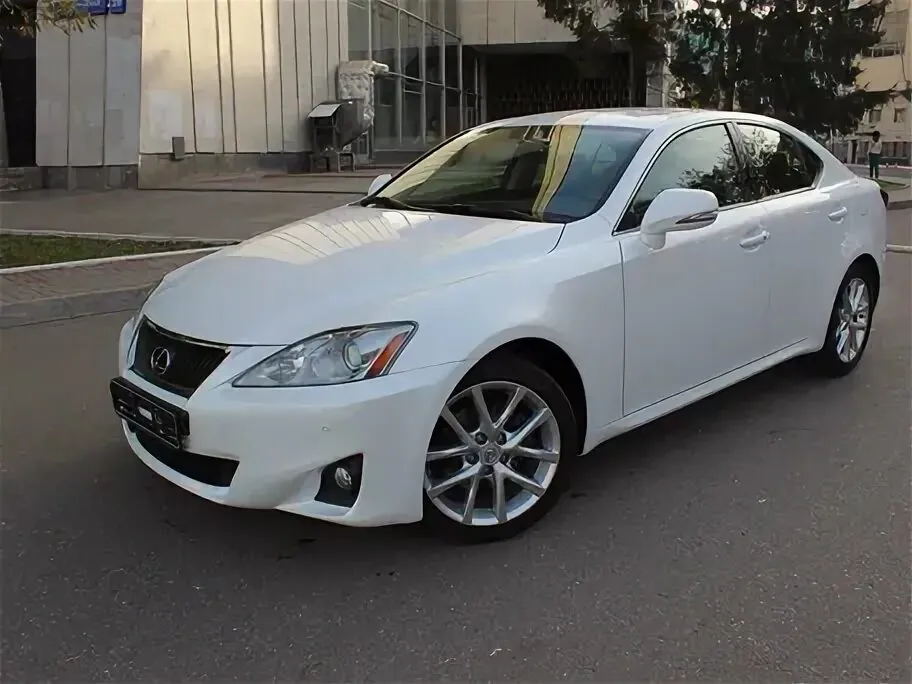 White Lexus IS250 parked on street